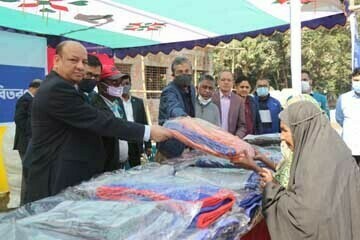 ATM Hayatuzzaman Khan, Former Chairman along with Emranul Huq, Managing Director and CEO of Dhaka Bank Limited, distributing blankets among the poor and distressed people of Araihazar Thana in Narayanganj recently. Mohammad Abu Jafar, AMD, AKM Shahnawaj,