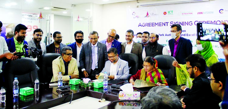 Hosne Ara Begum, Managing Director of Bangladesh Hi-Tech Park Authority and Gautam Saha, Managing Director of Excel Intelligent Solutions Ltd, signing a land leasing agreement at the conference room of Janata Tower Software Technology Park at Kawran Bazar