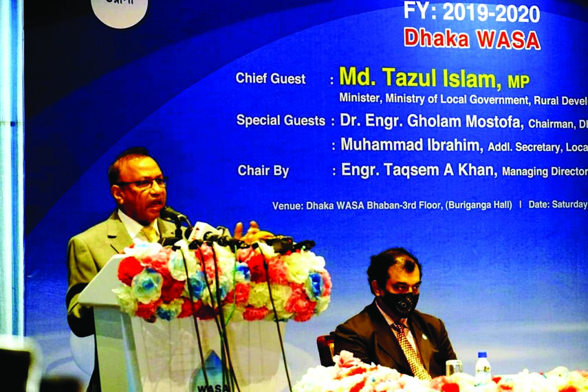 LGRD and Cooperatives Minister Tajul Islam speaks at the bill collection award distribution to Government and non-government banks at Dhaka WASA Bhaban on Saturday.