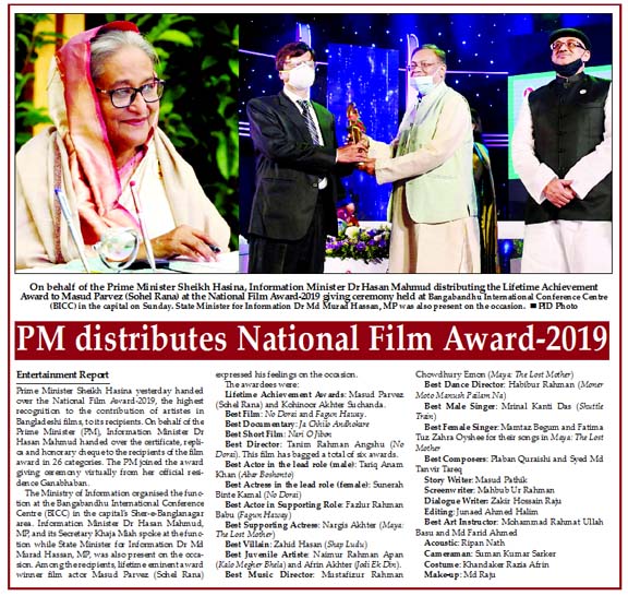 On behalf of the Prime Minister Sheikh Hasina, Information Minister Dr Hasan Mahmud distributing the Lifetime Achievement Award to Masud Parvez (Sohel Rana) at the National Film Award-2019 giving ceremony held at Bangabandhu International Conference Centr