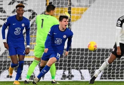 Chelsea's Mason Mount (center) reacts after scoring during the English Premier League soccer match between Fulham FC and Chelsea FC in London, Britain on Saturday.