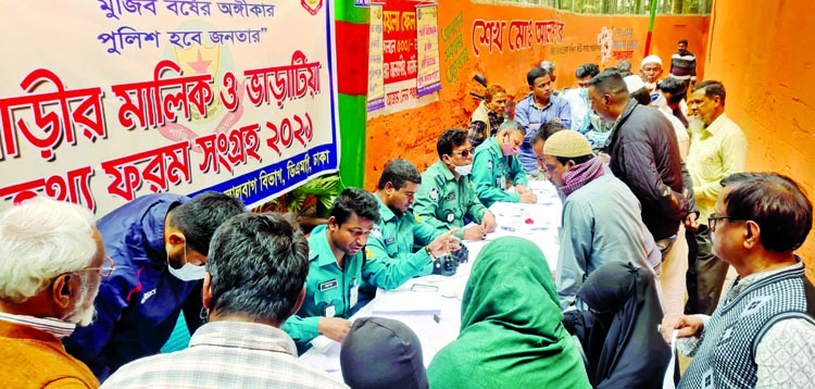 Police personnel remain busy with renewal information of house owners and tenants of different areas in the capital being set up booths in order to ensure family and social security on the inception of year. This photo was taken from a police booth at K M