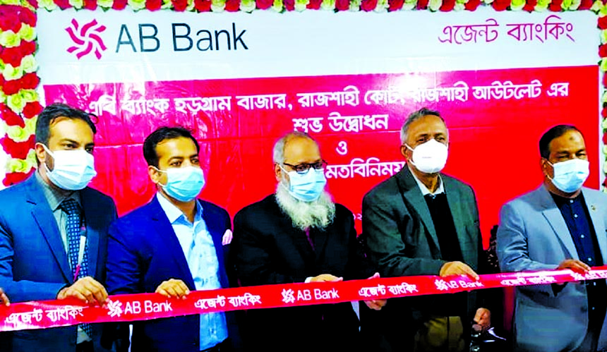 Lawmaker Fazle Hossan Badsha inaugurating AB Bank's agent banking outlet at Horogram Bazar recently. Fazle Rahman, Rajshahi Regional Head of the bank, was also present.