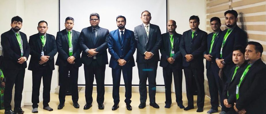 M.A. Razzak Khan Raj, Chairman along with Dilruba Tanu, Managing Director of Minister Group, poses for a photograph with the top executives after its Annual Sales Meeting held at its head office in the city Tuesday. CFO, head of all departments and sales