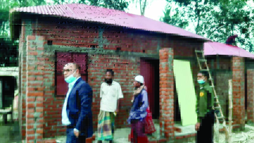 UNO Mejbaul Karim visits the under construction homes to be given homeless families in Tarash of Sirajganj on the occasion of Mujib Year.