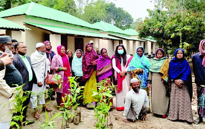 Gazipur's Sripur UNO hands over keys of homes to 10 landless and homeless families in the upazila's Udoykhali village under Telihati union on Wednesday as a gift from Prime Minister Sheikh Hasina marking the birth centenary of Father of the Nation Banga