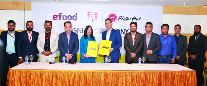 Shamima Nasrin, Chairman of Evaly and Amit Dev Thapa, Chief Executive Officer of Transcom Foods Limited, which owns KFC-Pizza Hut, exchanging a Memorandum of Understanding (MoU) document at a hotel in the city on Thursday. Under the deal, customers will b