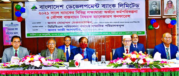 Mohammad Mejbahuddin, Chairman, Board of Directors of Bangladesh Development Bank Limited (BDBL), presiding over its 'Managers Business Conference - 2021' held at its head office in the city on Saturday. Md. Abu Hanif Khan, Subhash Chandra Sarker, Md. A