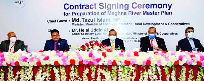 LGRD and Cooperatives Minister Tajul Islam, among others, at the contract signing ceremony for the preparation of Meghna River Master Plan at Hotel Sonargaon in the city on Saturday.