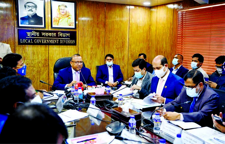 Local Government, Rural Development and Co-operatives Minister Md Tajul Islam presides over action plan review meeting adopted by Dhaka North and South City Corporation in order to prevent waterlogging from Dhaka city at Local Government Division conferen
