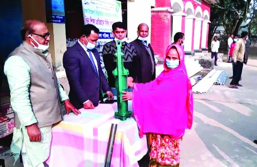 Nilphamari Zila Parishad Chairman Joinal Abedin distributes tube-wells among the poor people in Jaldhaka Upazila in the district on Monday afternoon.