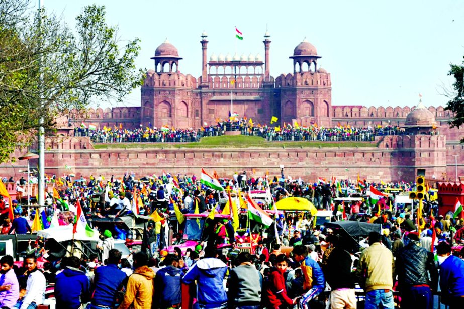 Farmers at the Red Fort as they continue to protest against the farm laws in New Delhi on Tuesday.