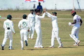 Rishad Hossain (cantre) of BCB XI celebrates with his team-mates after sending back Shayne Moseley on the first day of the three-day warm-up match against West Indies at the MA Aziz Stadium in Chattogram on Friday.
