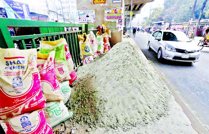 Many points beneath flyovers in the capital have gone under illegal occupation since opening of these elevated structures due to lack of proper oversight from the agencies concern. In this photo taken on Friday shows that sand piles up underneath Mouchak-