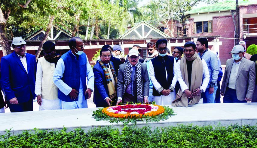 Director General of Bangladesh Water Development Board Engineer AKM Wahed Uddin Chowdhury along with other officials places floral tributes at the Mazar of Father of the Nation Bangabandhu Sheikh Mujibur Rahman at Tungipara in Gopalganj on Friday.