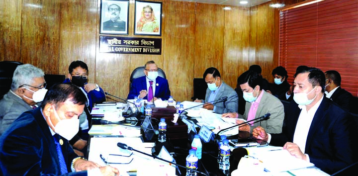 Local Government, Rural Development and Co-operatives Minister Md Tajul Islam presides over an improvement and review meeting related to Preparation of Master Plan of major rivers across the country at Local Government Division conference room in the city