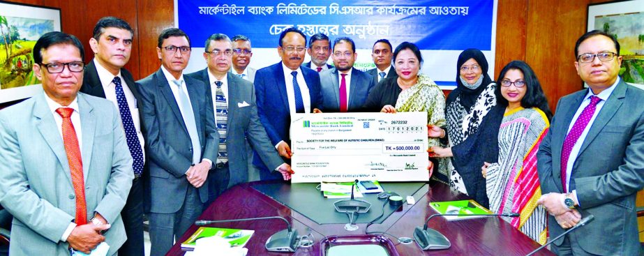 Md. Quamrul Islam Chowdhury, Managing Director & CEO of Mercantile Bank Limited, handing over a cheque of Tk.5.00 lakh to Subarna Chakma, Chairperson of Society for the Welfare of Autistic Children (SWAC) as the banks Corporate Social Responsibility at it