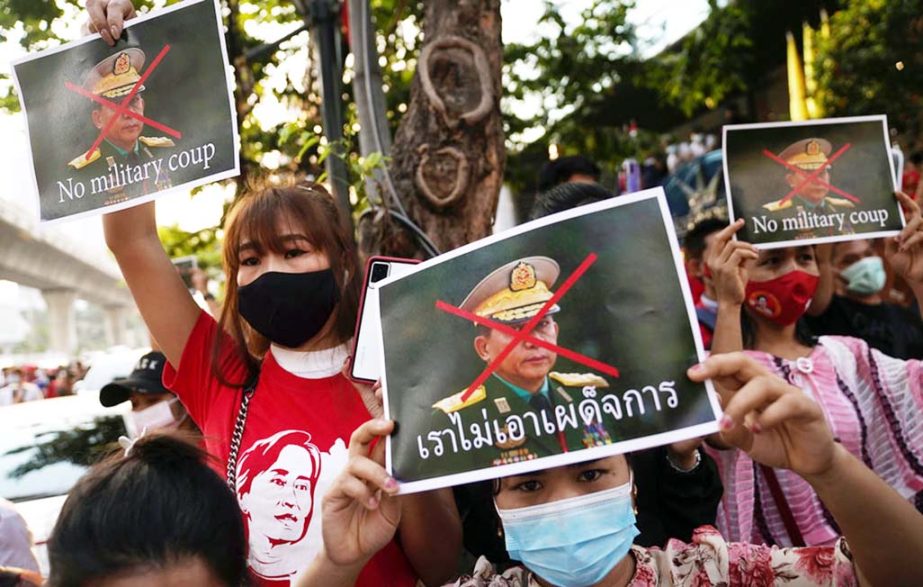 NLD supporters rally outside Myanmar's embassy after the military seized power from a democratically elected civilian government and arrested its leader Aung San Suu Kyi, in Bangkok on Mondy.