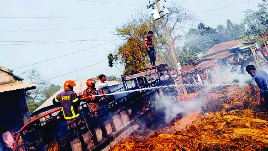 Fire fighters are seen trying to douses a fire that broke out at Saguna Union in Tarash Upazila of Sirajganj district on Monday afternoon.