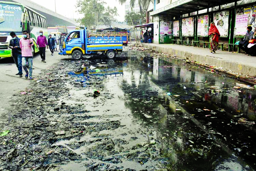 A truck stand has collected dirty and stinky water due to lack of proper maintenance near Jatrabari T&T Office passenger shed in the capital on Tuesday.