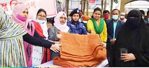 Chandpur DC Anjana Khan Majlish distributes blankets among 150 cold-hit poor and destitute women at a function on Chandpur Baburhat School& College premises on Tuesday on behalf of BCS Women Network.