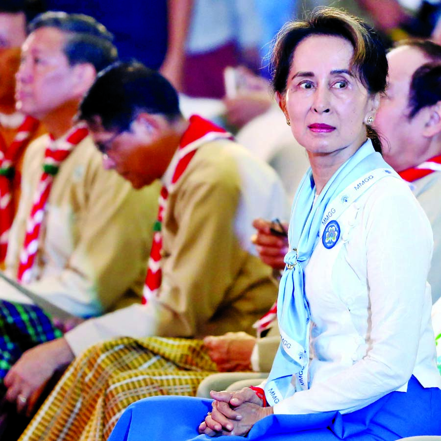 Medical workers pose during a protest against the coup that removed elected leader Aung San Suu Kyi at Yangon General Hospital.