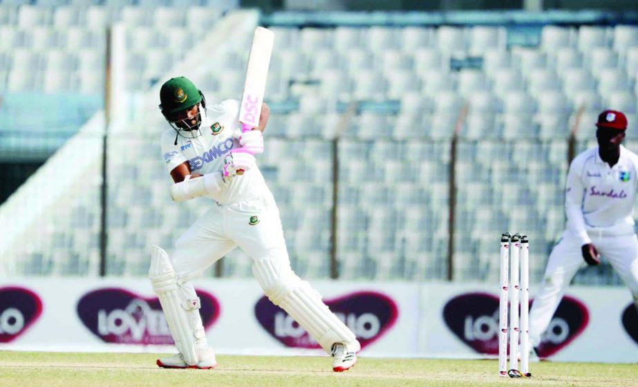 Shadman Islam of Bangladesh, plays a shot on the first day of the first Test against West Indies at the Zahur Ahmed Chowdhury Stadium in Chattogram on Wednesday. Shadman hit 59.