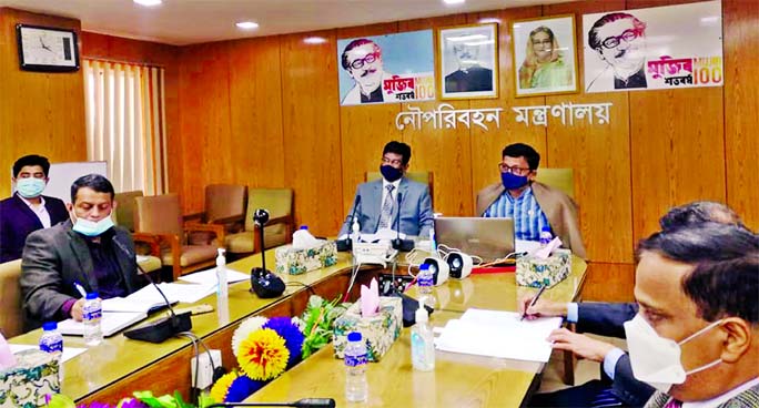 State Minister for Shipping Khalid Mahmud Chowdhury presides over the meeting about buying of six LNG ships for the Bangladesh Shipping Corporation at the seminar room of the ministry on Thursday.