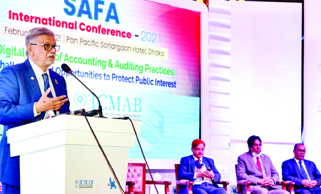Planning Minister MA Mannan speaks at the international conference of South Asian Federation of Accountants at Hotel Sonargaon in the city on Friday.