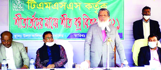 Deputy Speaker Advocate Md. Fazle Rabbi Miah, MP, speaks at the winter cloths distribution ceremony in Saghata of Gaibandha District yesterday.