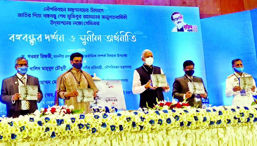 International Relation Affairs Adviser to Prime Minister Professor Dr Gowher Rizvi unveils the cover of a compilation named 'Sonar Banglay Sunil Sopno' as the chief guest at a seminar titled 'Bangabandhur Dorshon O Sunil Othhoniti' published by Shippi