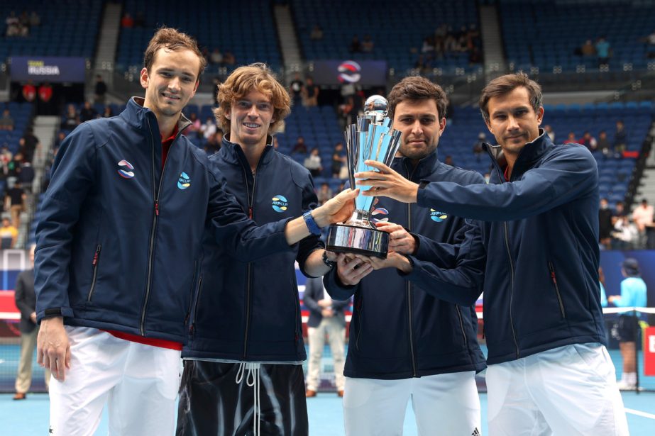 (From left to right) Russia's Daniil Medvedev, Andrey Rublev, Aslan Karatsev and Evgeny Donskoy celebrate with the trophy after winning the ATP Cup final against Italy on Sunday.