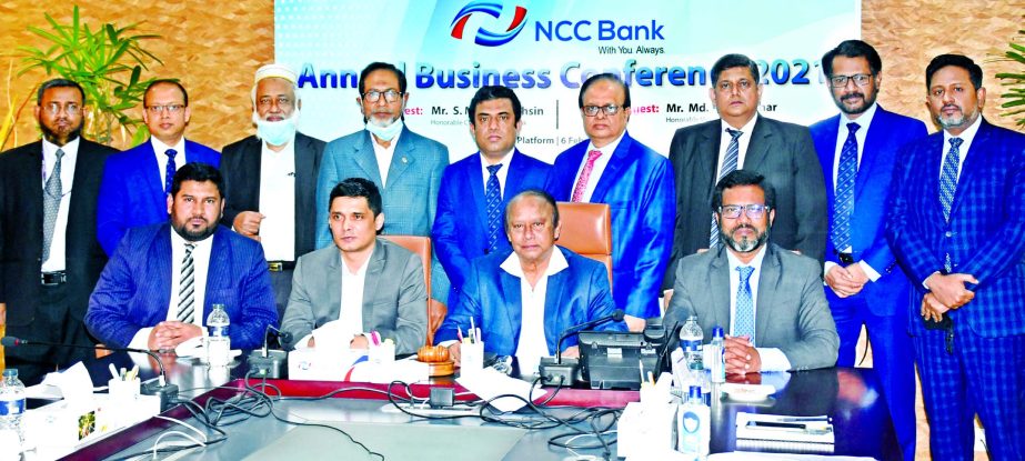 SM Abu Mohsin, Chairman of NCC Bank Limited, presiding over the banks Annual Business Conference-2021 held through digital platform on Saturday. Md. Abul Bashar, Vice-Chairman, Md. Nurun Newaz Salim, Director & Chairman of the Risk Management Committee, S