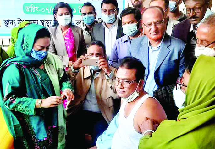 Anwarul Azim Anar, MP, receives Covid-19 vaccine at the Kaliganj Upazila Health Complex on Sunday.