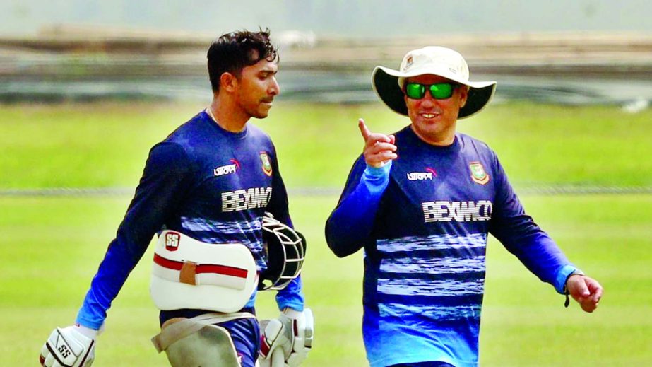 Head Coach of Bangladesh Cricket team Russell Domingo (right) giving tips to Soumya Sarkar during the practice session of the Tigers at the Sher-e-Bangla National Cricket Stadium in the city's Mirpur on Wednesday.
