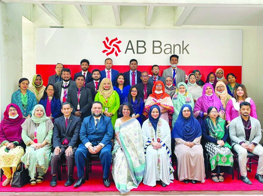 Shamshia I. Mutasim, DMD and Head of HR of AB Bank Limited, poses for a photo with the participants of a training session on 'Customer Service Skills for Bank Employees' organised by the banks training academy in the city recently. Tahniyat Ahmed Karim,