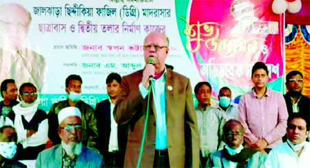 State Minister for LGRD and Cooperatives Swapon Bhattachariya speaks after the inauguration of construction work of students' hostel of Jaljhara Siddiquia Fazil Madrasha at Manirampur Upazila in Jashore on Friday.