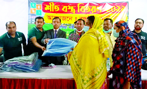 Winter clothes were distributed among the helpless people under the initiative of Kapasia Pilotian Bandhu-92's at Kapasia in Gazipur on Thursday afternoon. Kapasia Upazila Parishad Chairman and District Awami League Vice-President Advocate Md. Amanat Hos