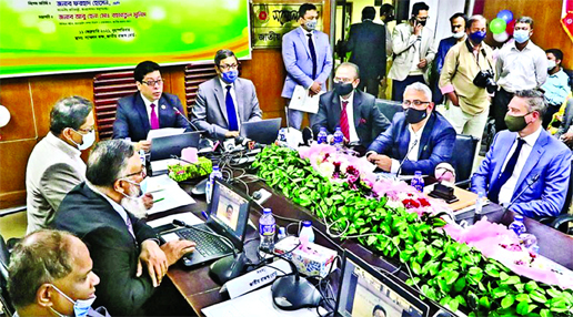State Minister for Public Administration Farhad Hossain speaking at a ceremony organized to honour the highest taxpayers with tax cards at the conference room of the National Board of Revenue (NBR) in the city on Thursday. NBR Chairman Abu Hena Md Rahmat