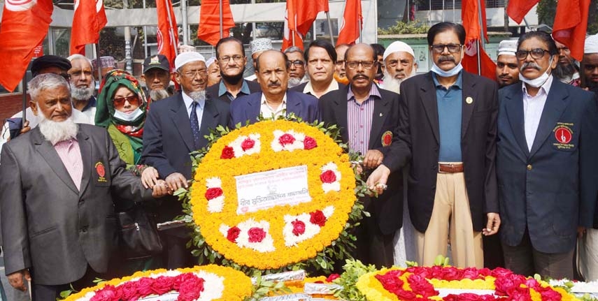 Bangladesh Muktijoddha Sangsad pays floral tributes at the portrait of Bangabandhu at 32, Dhanmondi in the city on Saturday marking its founding anniversary.