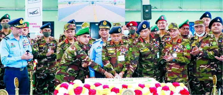 Army Chief General Aziz Ahmed cuts cake marking the concluding ceremony of Graduation of Aviation Basic Course-11 at the hangar of Army Aviation Group in the city's Tejgaon on Tuesday. ISPR photo
