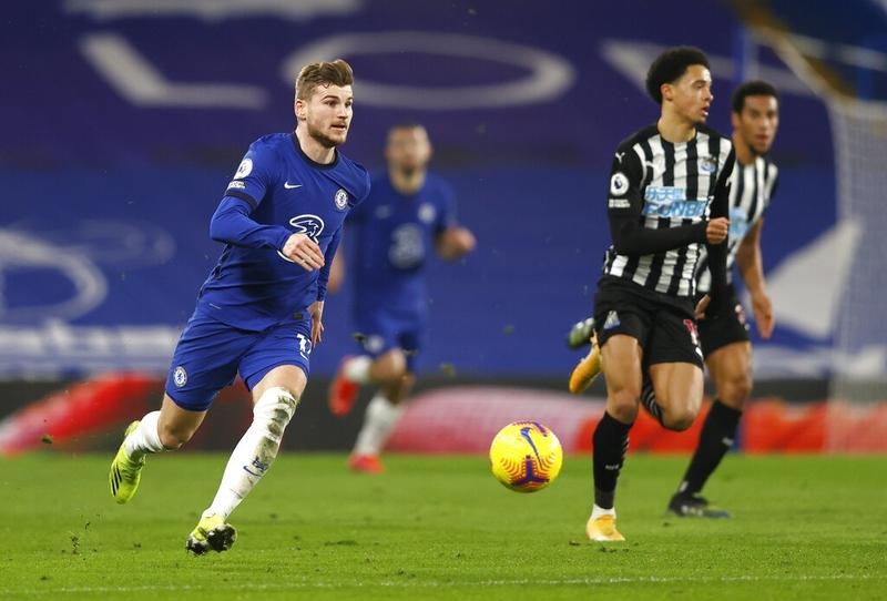 Chelsea's Timo Werner (Left) in action during the English Premier League soccer match against Newcastle United at Stamford Bridge Stadium in London, England on Monday.