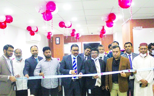 Md. Monzur Mofiz, AMD of ONE Bank Limited, inaugurating the banks sub-branch at Senbag in Noakhali on Sunday. Senior officials of the bank and local elites were present.