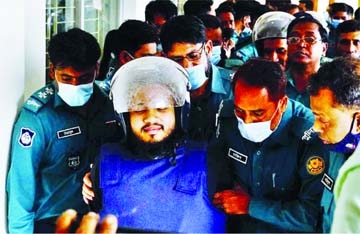 Police escort a convict from a Dhaka court following verdict in blogger Avijit Roy murder case on Tuesday