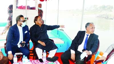 Mayor of Rajshahi City Corporation AHM Khairuzzaman Liton and representatives of Marsh International visit project areas of 'River City' on Char land in Padma on a speedboat on Thursday afternoon.