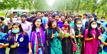 Students of Jahangirnagar University bring out a procession on Saturday demanding for re-opening their halls.