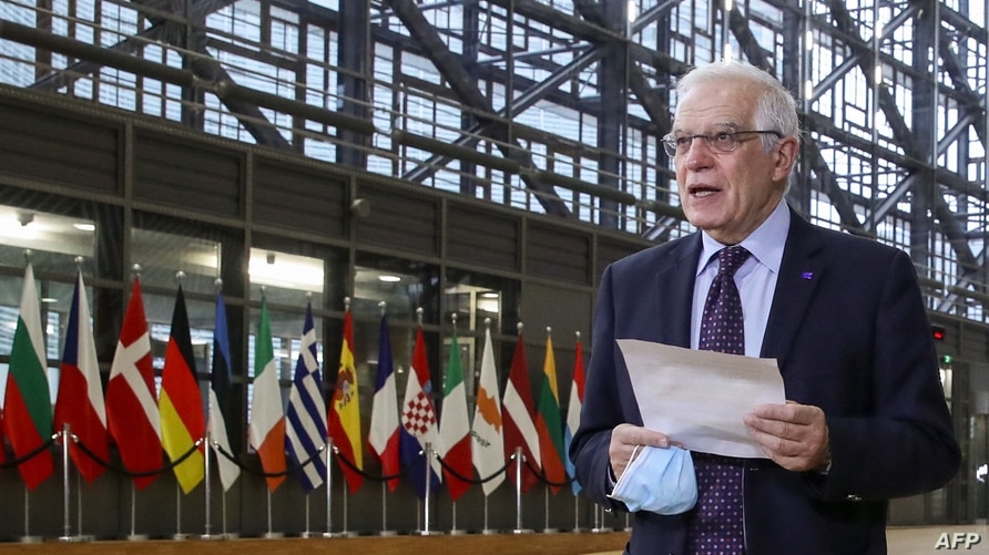 EU High Representative of the Union for Foreign Affairs and Security Policy Josep Borrell talks to the press as he arrives to attend an EU Foreign Ministers meeting in Brussels, Feb. 22, 2021.