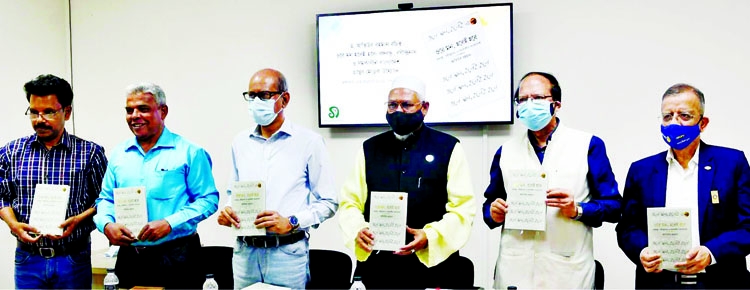 State Minister for Religion Faridul Haque Khan , among others, holds the copies of a book titled 'Ore Mon, Habei Habe- Bangabandhu, Rabindranath O Samokalin Bangladesh' written by Dr. Atiur Rahman at Banglamotor in the city on Tuesday.