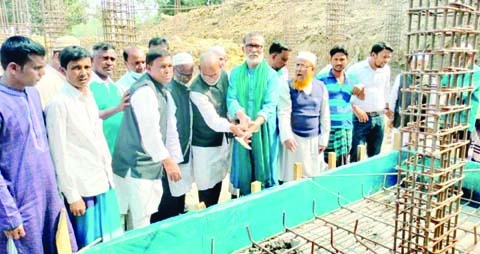 Alhaj Sirajul Islam Khan Raju, Chairman of Bogura's Adamdighi Upazila Parishad, inaugurates the construction work of a 4-storey building of Siddiqiya Dakhil Madrasa at Chatkhair of Nasratpur Union in the upazila at a cost of Tk 3.26 crore on Tuesday. Ass