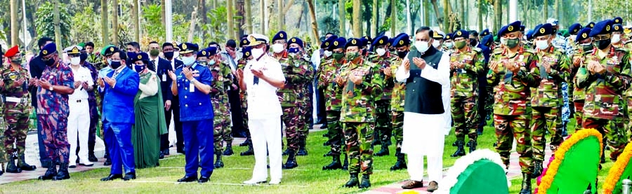 Military Secretaries of President and Prime Minister, Home Minister, Chiefs of three services and other high officials offer munajat after paying floral tributes at the graves of army members martyred in Pilkhana at Banani Army Graveyard in the city on T